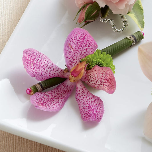 Pink Mokara Boutonniere